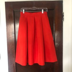 Red midi skirt with pockets